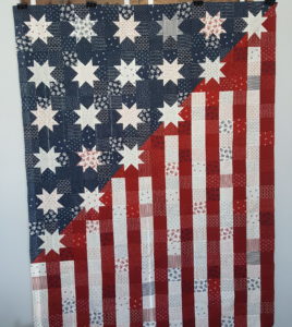 Fully pieced Our Flag Stands for Freedom quilt top